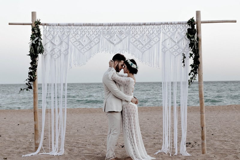 Wedding couple holding hands